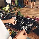 Hire a professional DJ to liven up your next corporate event